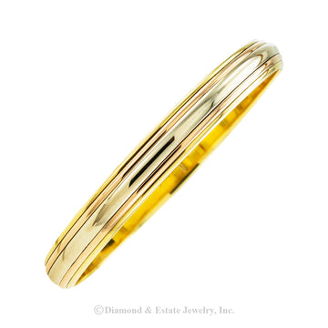 Cartier tricolor gold slip-on bangle bracelet.   Jacob's Diamond & Estate Jewelry.