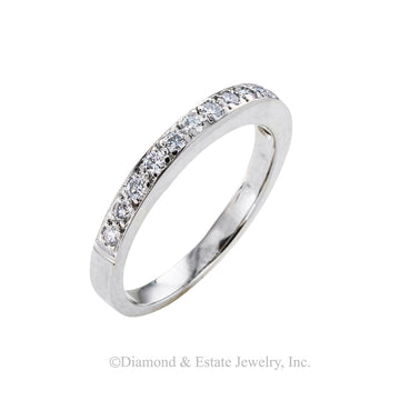 Diamond and platinum half eternity ring size 5 circa 1990.