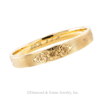 Antique yellow gold slip-on bangle bracelet dated 1912. Jacob's Diamond & Estate Jewelry.