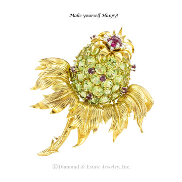 Tiffany Schlumberger peridot and ruby gold thistle clip brooch circa 1960.  Jacob's Diamond & Estate Jewelry.