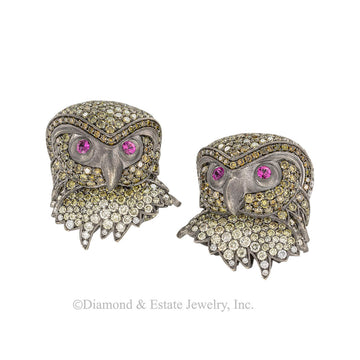 Color diamonds and pink sapphires owl head black gold cufflinks. 