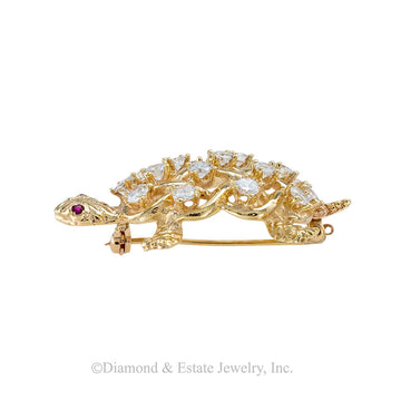 Diamond, ruby, and yellow gold turtle brooch circa 1960.