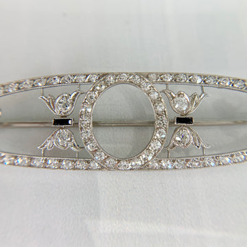 Edwardian Platinum Brooch by Dreicer & Co. with Diamonds and Onyx - Jacob's Diamond and Estate Jewelry