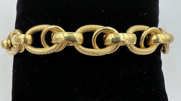 Italian Shiny And Textured Yellow Gold Link Bracelet 1980s