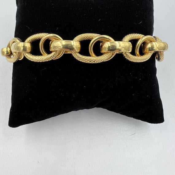 Italian Shiny And Textured Yellow Gold Link Bracelet 1980s