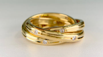Cartier Constellation Trinity Rolling Band Ring 18k Yellow Gold