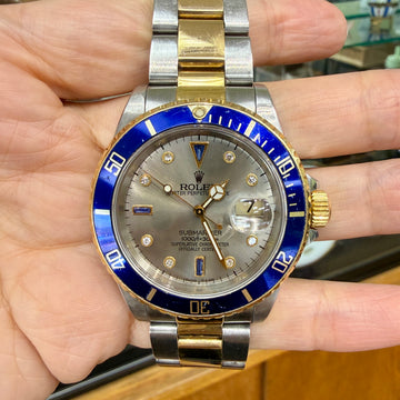 Rolex 16613 Submariner "Serti" 18K YG / SS Silver Dial Circa. 1993 - Jacob's Diamond and Estate Jewelry