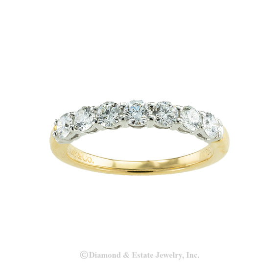 Tiffany & Co seven-stone diamond gold and platinum wedding band. Jacob's Diamond & Estate Jewelry.