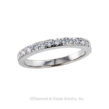 Diamond and platinum half eternity ring size 5 circa 1990.