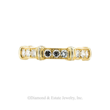 Cartier diamond and two-tone gold eternity ring circa 1990. Jacob's Diamond & Estate Jewelry.