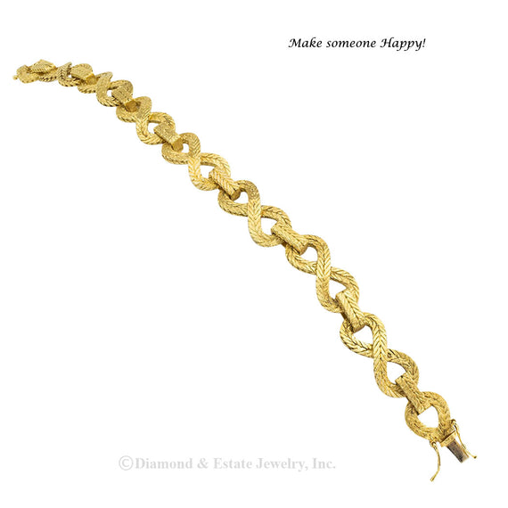Engraved yellow gold link bracelet circa 1970. Jacob's Diamond & Estate Jewelry.