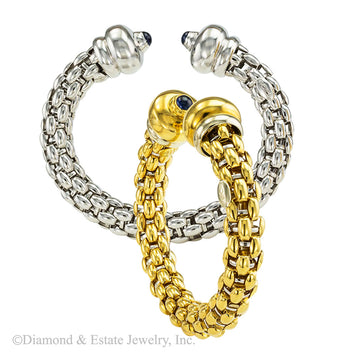 A pair of Fope sapphire yellow and white woven gold slip-on cuff bracelets circa 2000. Jacob's Diamond & Estate Jewelry.