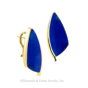Lapis lazuli and yellow gold Modernist-inspired omega clip with post earrings circa 1990. Jacob's Diamond & Estate Jewelry.