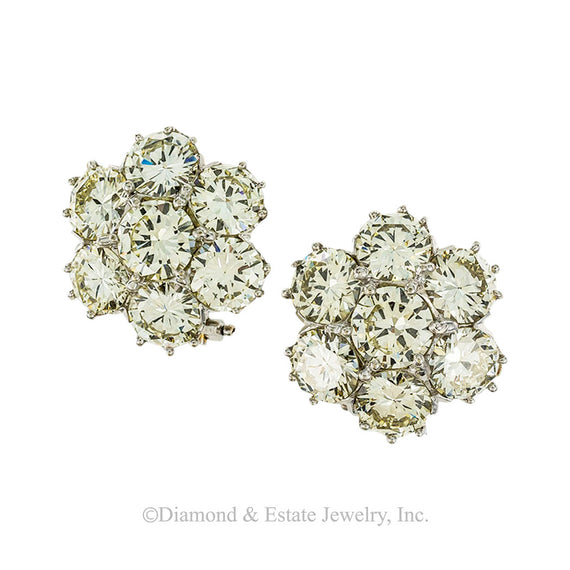 Lite yellow color 8.50 carats diamond cluster clip and post white gold earrings circa 1950. Jacob's Diamond & Estate Jewelry.