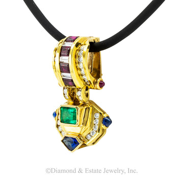 Emerald ruby sapphire diamond and gold enhancer pendant circa 1980. Jacob's Diamond & Estate Jewelry.