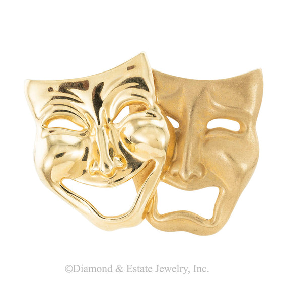 Yellow gold comedy and tragedy theater masks brooch circa 1990.  Jacob's Diamond & Estate Jewelry.