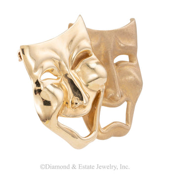 Yellow gold comedy and tragedy theater masks brooch circa 1990.  Jacob's Diamond & Estate Jewelry.