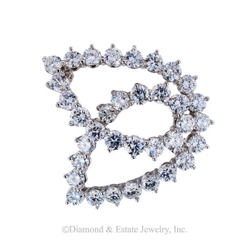 Tiffany & Co diamond and platinum abstract swirl brooch circa 1980.  