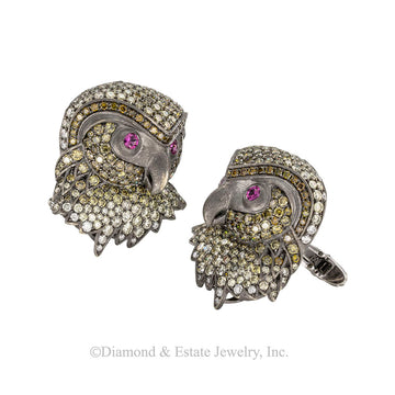 Color diamonds and pink sapphires owl head black gold cufflinks. 