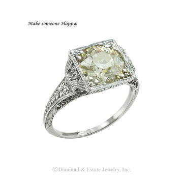 GIA report certified 2.50 carats old European-cut diamond light yellow color and platinum engagement ring circa 1925. Jacob's Diamond & Estate Jewelry.