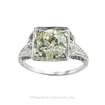 GIA report certified 2.50 carats old European-cut diamond light yellow color and platinum engagement ring circa 1925. Jacob's Diamond & Estate Jewelry.